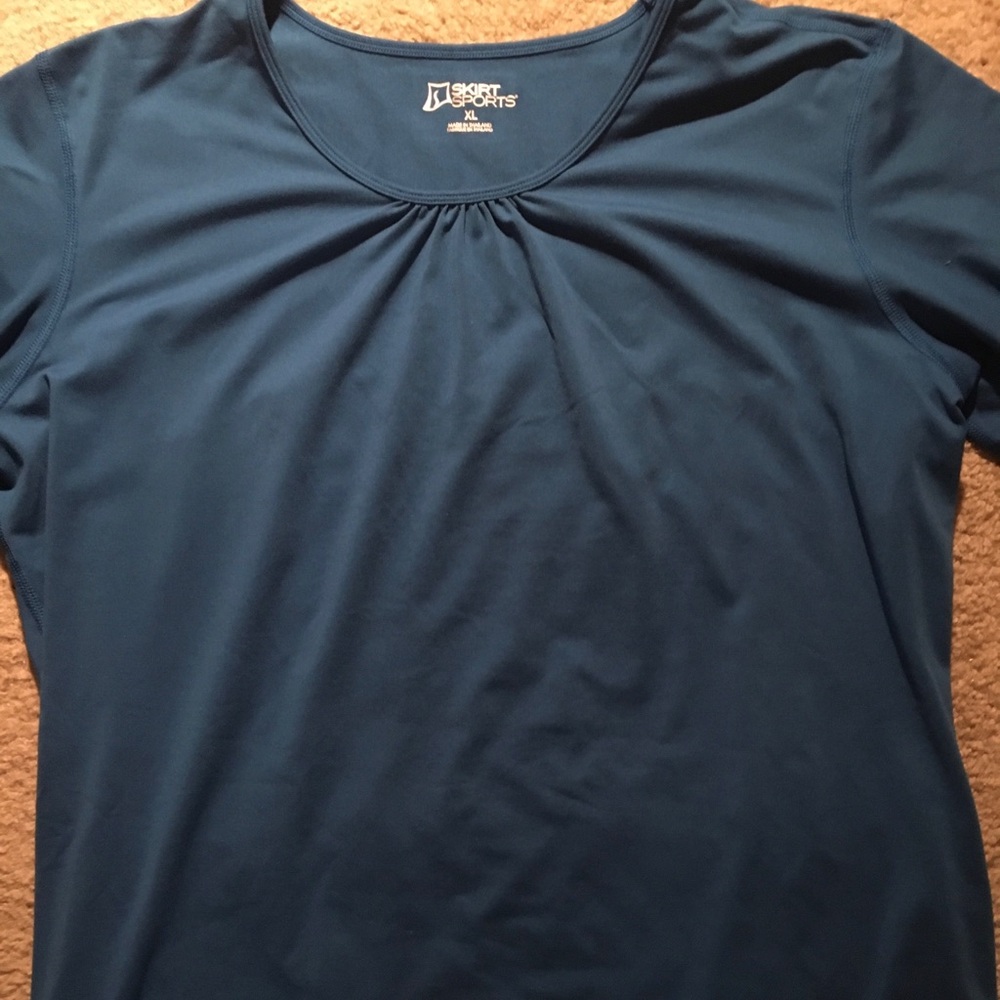 Blue shirt from Skirt Sports.